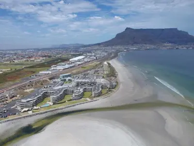 an aerial view of a beach with condos and the ocean at Key West 417 by CTHA in Cape Town