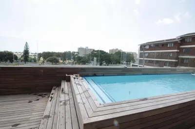 a large swimming pool on top of a building at Key West 417 by CTHA in Cape Town