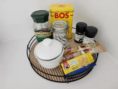 a shelf with food and other items on it at Mossel 11 Studio in Bloubergstrand