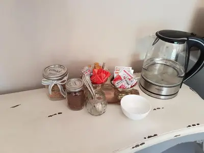 a counter with jars of food and a blender on it at 35 on Basil in Caledon