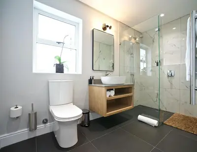 a bathroom with a toilet and a sink and a shower at Bonne Esperance Boutique Guest House in Stellenbosch