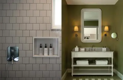a bathroom with a sink and a mirror at Maison Cabrière Boutique Hotel in Franschhoek