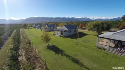 an aerial view of a house with a yard at Paddabult Self Catering Cottages in Paarl