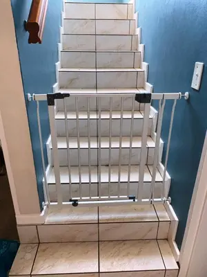 a set of stairs with a metal railing at Akwa in Hermanus