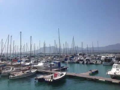 a bunch of boats docked in a harbor at Bergsig Selfcatering in Gordonʼs Bay
