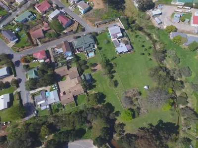 an overhead view of a yard with houses at Town and Country in Caledon