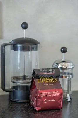 a food processor and a box on a counter at 29 Earlibelle in Stellenbosch