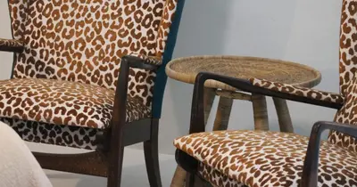 a room with two chairs and a table at Mount Grace Country House in Greyton