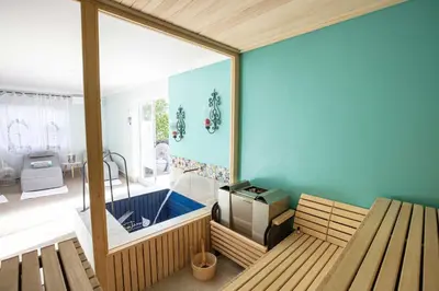 a room with a bench and a large window at Sweetwater Guesthouse in Wellington