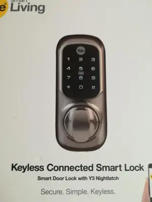 a smart phone with a smart door lock with v repeater at A310 Lagoon Beach Apartment & Spa in Cape Town