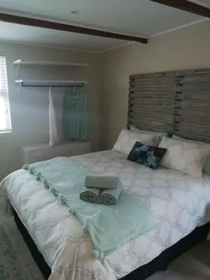 a bedroom with a large bed with a tray on it at Posto Al Sole - IL Bacio in Bellville