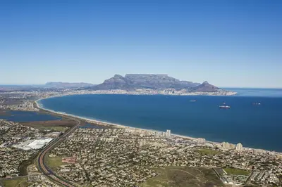 an aerial view of a city and the ocean at Peach on Beach Boutique Guesthouse in Bloubergstrand