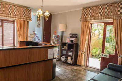 a kitchen with a counter and a door to a yard at Ramasibi Guest Services in Panorama