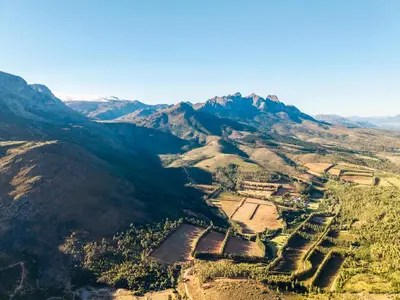 an aerial view of an ancient city in the mountains at AfriCamps at Doolhof Wine Estate in Wellington