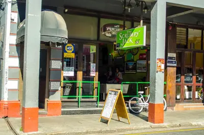 a sandwich shop with a sign in front of it at Cape Town Micro Apartments in Cape Town