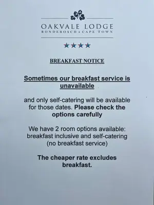a sign for a breakfast node with a text overlay at Oakvale Lodge in Cape Town