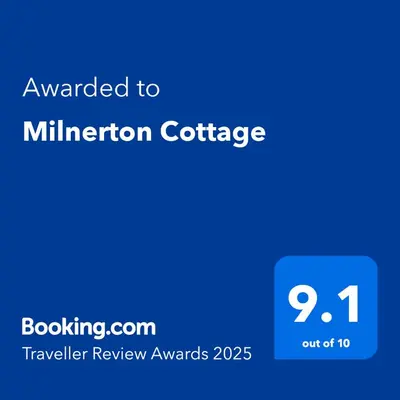 a blue screen with the text awarded to minnesota conference conference at Milnerton Cottage in Cape Town