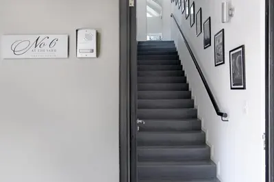 a staircase leading up to a room with a stair case at No. 6 The Yard in Franschhoek