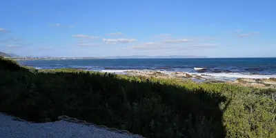 a view of a beach with the ocean at Beach Villa Apartment in Hermanus