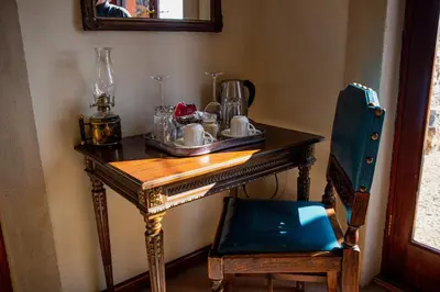 a wooden table with a sink in a room at Casa Mori House in Stellenbosch