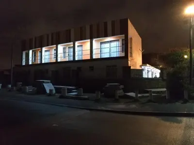 a building at night with the lights on at Liziwe's Guest House in Matroosfontein