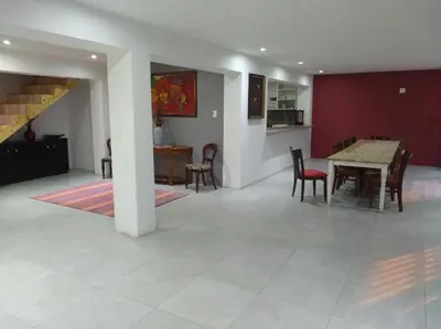 a dining room and kitchen with a table and chairs at Liziwe's Guest House in Matroosfontein