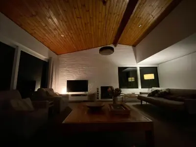 a living room with a couch and a coffee table at Views Views Views in Hermanus