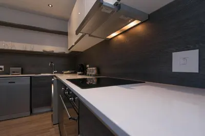 a kitchen with a sink and a counter top at Six One Five at Matrix in Cape Town