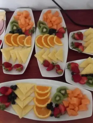 a group of plates with different types of fruit on them at LA RÉVERIE in Franschhoek