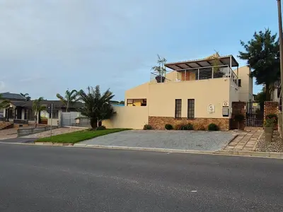 a house on the side of a street at Walters Lane Economy Apartment 1 - No Loadshedding in Cape Town