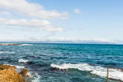 a view of the ocean from the shore at Bayview 208 in Hermanus
