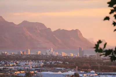 a view of a city with mountains in the background at Somerset-West, Heldervue in Cape Town