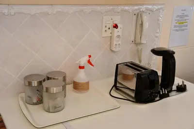 a kitchen counter with a blender and a toaster at Bradclin Sport Newlands in Cape Town