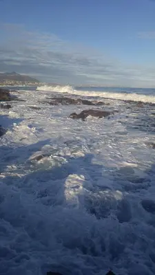 a view of the ocean with clouds in the water at Angel's Place by the Sea in Hermanus
