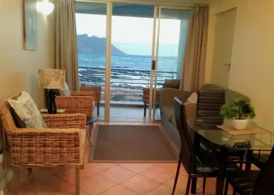 a living room with a view of the ocean at OCEANPEARL 209 in Strand