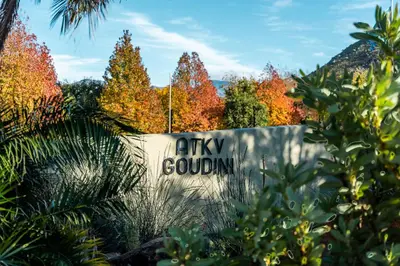 a sign for a city garden with trees in the background at ATKV Goudini Spa in Rawsonville