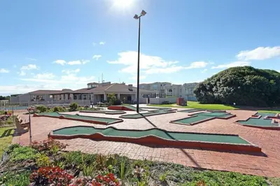 a park with a bunch of trays on the ground at Hermanus Beach Club - 106 - Apartment with a view in Hermanus