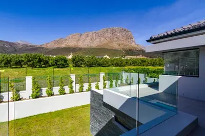 a house with a view of the mountains at Villa de luxe in Franschhoek