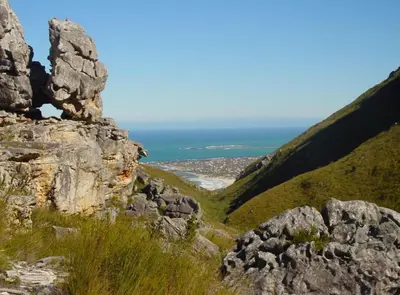 a view from the top of a mountain at Jocks Place (on the sea) in Bettyʼs Bay