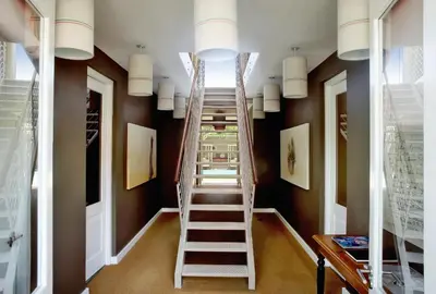 a stairwell with a ladder in a room at The Library in Franschhoek