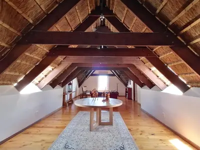 a room with a table in the middle of a room at Avontuur Manor House and Wine Estate in Somerset West
