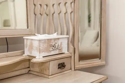 a bathroom with a mirror and a box with bees on it at Invergara in Cape Town