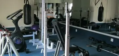 a gym with lots of exercise equipment in it at Hermanus Beach Club - Le Maree House 18 in Hermanus