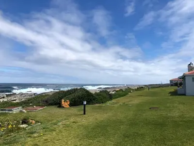 a view of the ocean from a house at Hermanus Beach Club - Le Maree House 18 in Hermanus