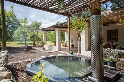 a pool in the backyard of a house at Hoogwater Cottage in Wolseley