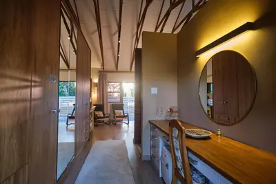 a bathroom with a counter and a mirror on the wall at The Cottage Farm in Stellenbosch