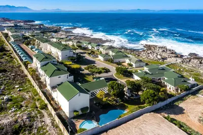 an aerial view of a resort on the coast at 29@Whale Rock Estate in Hermanus