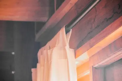 a curtain on a window in a room at Stonewood Mountain Cabin in Breerivier