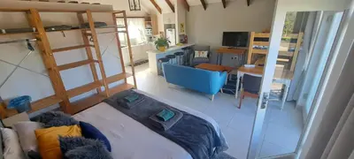 an aerial view of a living room with a bunk bed at Cape Dutch Flair in Durbanville