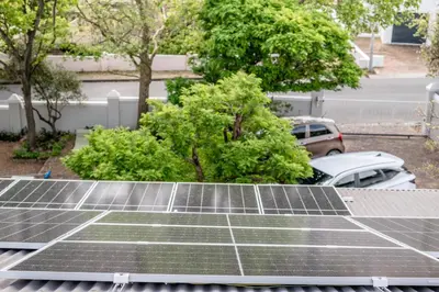 a group of solar panels on top of a roof at Corner House Residence in Franschhoek